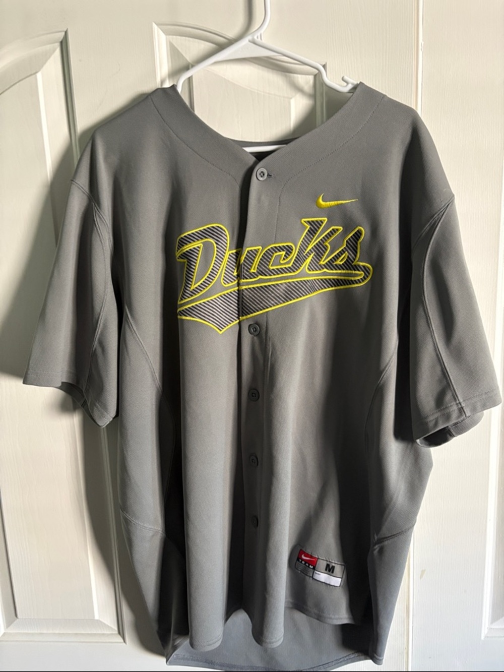 Nike Grey Men's Baseball Jersey with Yellow Script
